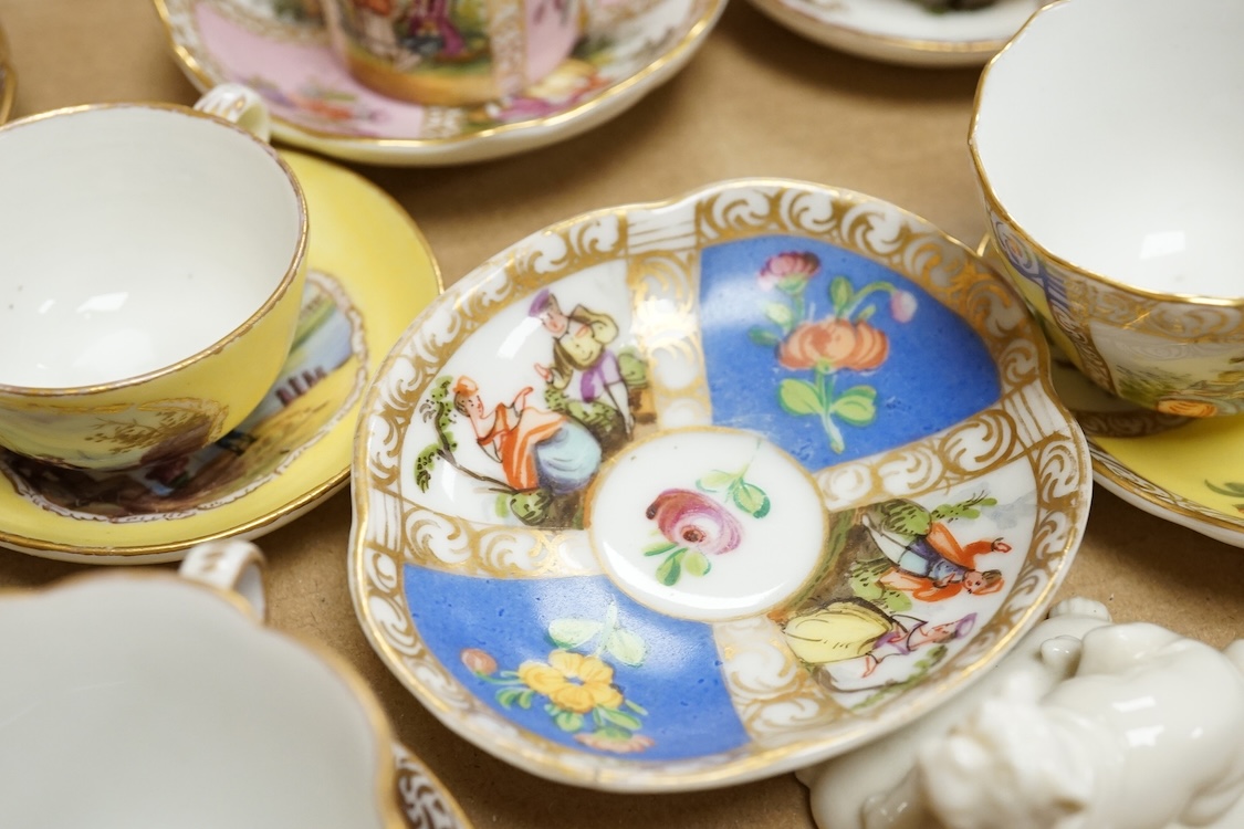 A group of 19th/20th century German porcelain, comprising a Nymphenburg pug, seven Dresden miniature cups and saucers and a Meissen bottle, largest 13cm high